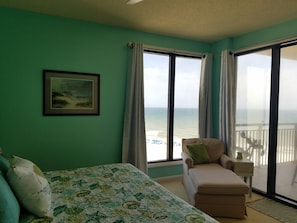 King Master with corner beach views and opening to balcony