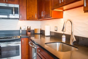 Custom cabinetry and granite countertops.