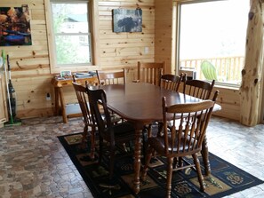 Spacious dining room with gorgeous views of the lake.  