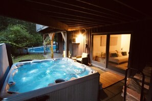 Year round hot tub, just steps outside lower lounge