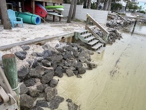 Easy entry to water behind home with paddle boards, kayaks, floating pads & more