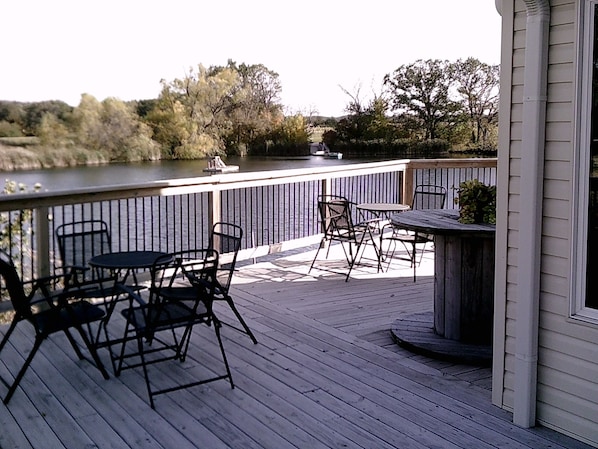 Enjoy the huge wrap around deck over looking the pond