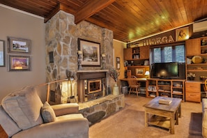 All natural stone fireplace takes the chill off on cool evenings