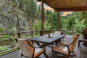 Enjoy your meals on the large 40' covered deck that overlooks the creek!