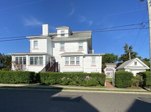Side view of the house with private entrance to the apartment.
