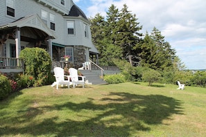 Front decking and lawn looking out to the ocean
