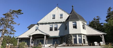 Front view of the house and wrap around deck