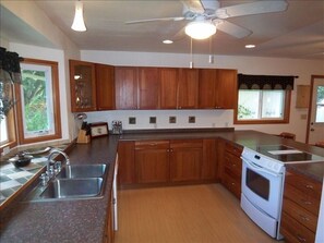 This is a big kitchen - and well-stocked with pots/pans/dishes/etc.