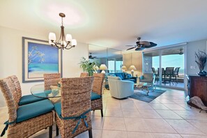 Dining room table with unique dolphin pedestal; seats six 