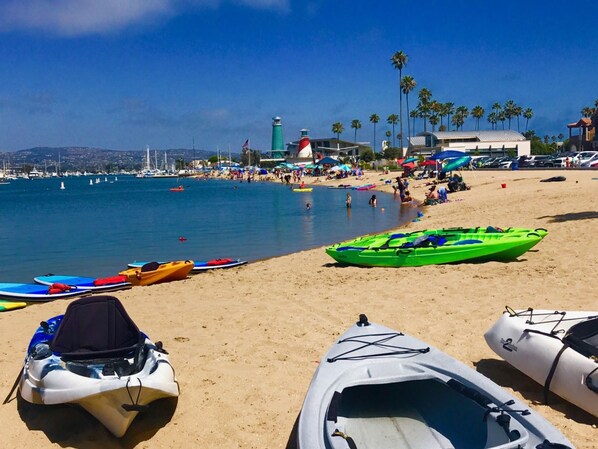 Our Beach at Marina Park Rent Paddle Boards and Kayaks Around the Corner..they Bring Them to the Beach in Front. No Schlepping