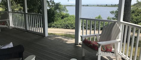 The huge wraparound porch overlooks Farm Pond and Nantucket Sound. 