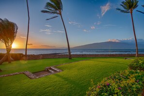 Sunset looking to the right from our lanai and showing the island of Lanai.