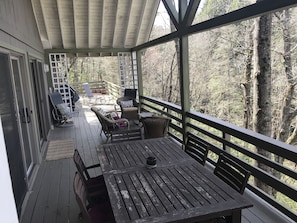 Dine alfresco on back deck overlooking lake 