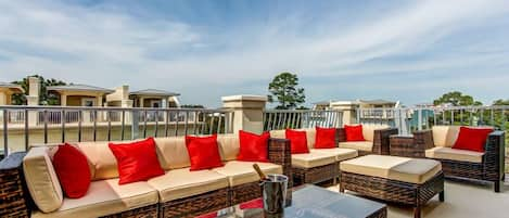 Rooftop terrace offers front row seating to views of the gulf and sunsets. 