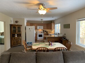 view of the dining and kitchen from the living room