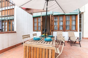 Private Terrace. Faces inside the courtyard. No noise after 10pm and till 8am.