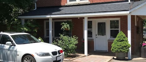 The covered front porch will provide a relaxing place to sit outside if it rains