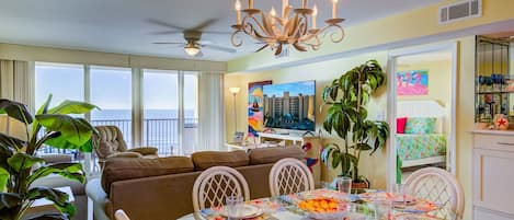 Spacious Living/Dining area with 65" television and gulf view.