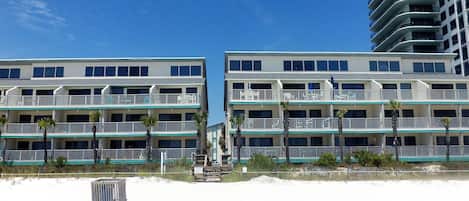 Perfect beach location of Nautical Watch.. sits below the high-rises of PCB.