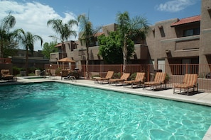 Your patio is steps away from the main, heated pool