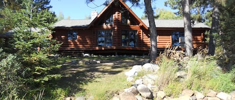 Log sided lakehome is located on the water's edge