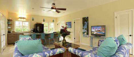 Living room, kitchen, and bar
adjoining private pool. Eco-friendly furnishings.