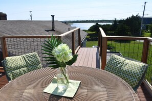 Roof Deck Dining Area with view of Richmond Pond