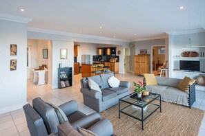 Open plan lounge, kitchen, and entrance hall