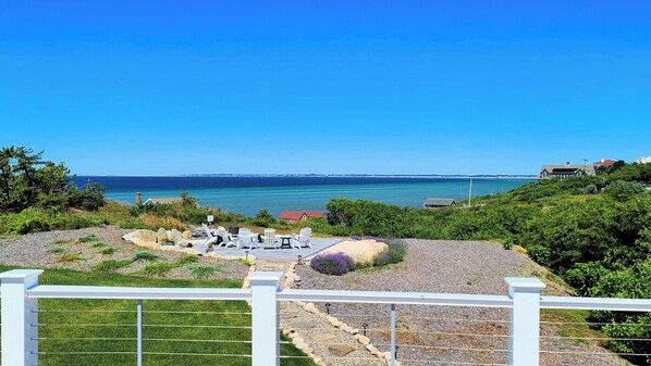 View from upper deck with access from exterior and second floor primary bedroom