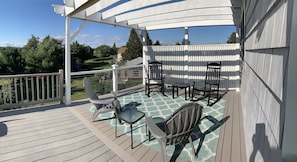 Upper Pergola with pullout sunshade. 
