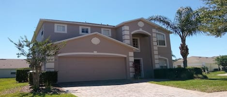 Beautiful pool home with paved driveway for two vehicles