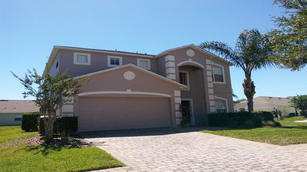 Beautiful pool home with paved driveway for two vehicles