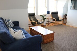 Second floor loft area with TV