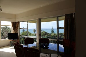 table with 8 chairs and  great views.