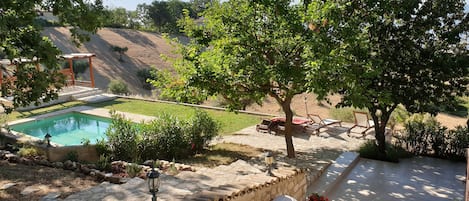 Stairs and pool area (house to the right)