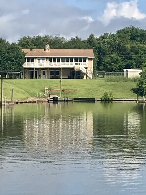 Our home, dock and boat slip, from the cove. Great fishing here!
