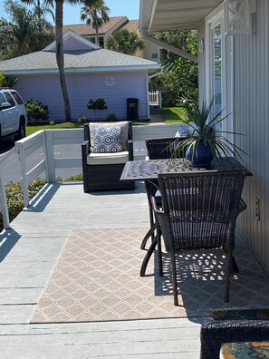 Comfortable porch with charcoal grill
