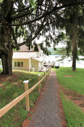 Walkway from the parking area to the front door.