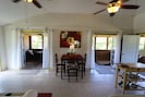 Walk from the living room onto the 50 foot wrap around screened in porch. 