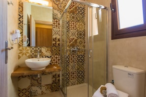 Downstairs bathroom with walk in shower for your convenience.