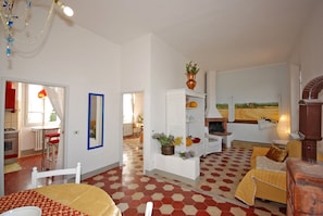 dining room, entrance with table and sofa