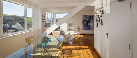 Second floor: Modern dining area of top floor 'apartment'