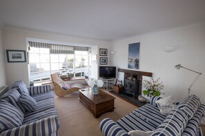 Trethoway, Port Isaac. Ground floor: Cosy sitting room with comfy sofas and television