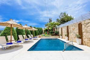 Amazing pool terrace with sun beds & umbrellas!