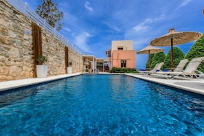 While outdoors, the terrace is complemented by a great private swimming pool!