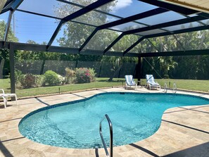 Pool overlooking private garden