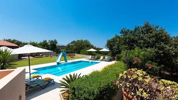 The pool area offering enough space for the whole family and full privacy