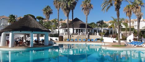 The magnificent palm fringed pool with Tucano's restaurant in the background