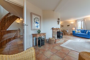 First floor:  Sitting room showing staircases from ground floor and up to the second floor
