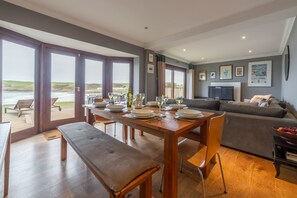 Pentewan, Polzeath. Outside the dining and sitting area is a wonderful sun deck with outdoor dining and bathing furniture